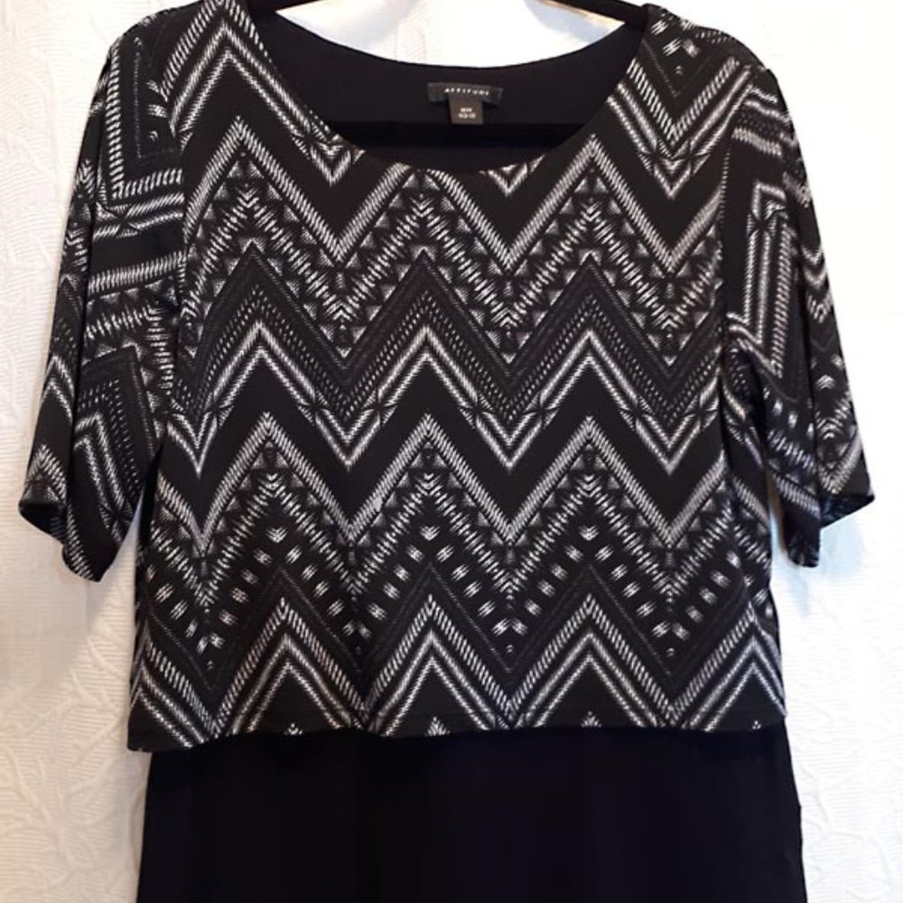 “Attitude" Top in black and grey. Size medium. Like new